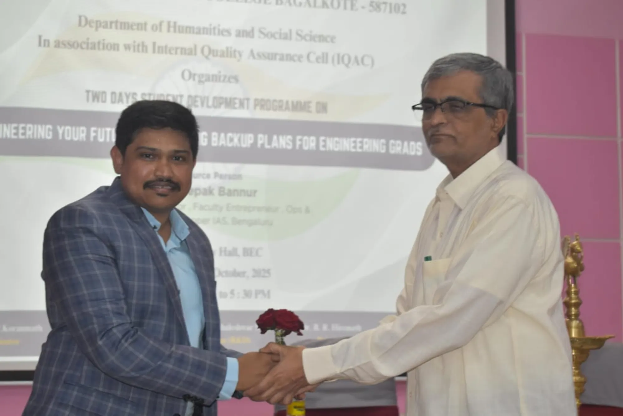 Floral welcome of the resource person by the in-charge Principal