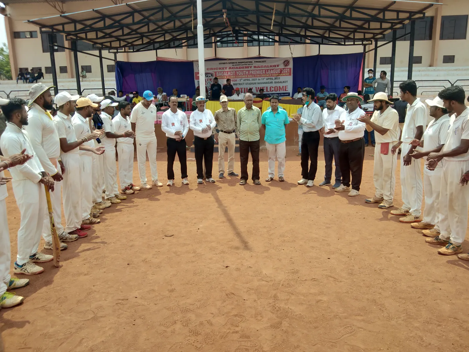 Cricket teams gather for the opening ceremony of an inter-collegiate tournament at BEC