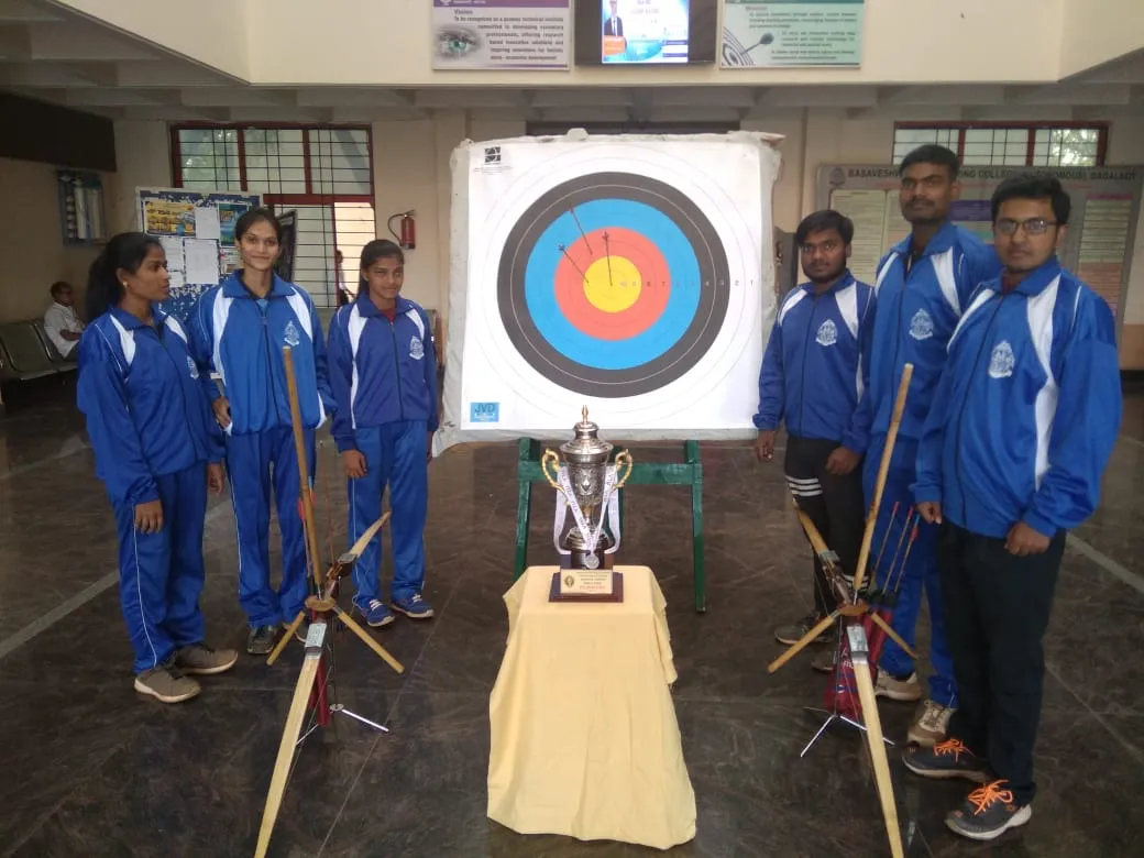 The BEC archery team with their target and championship trophy