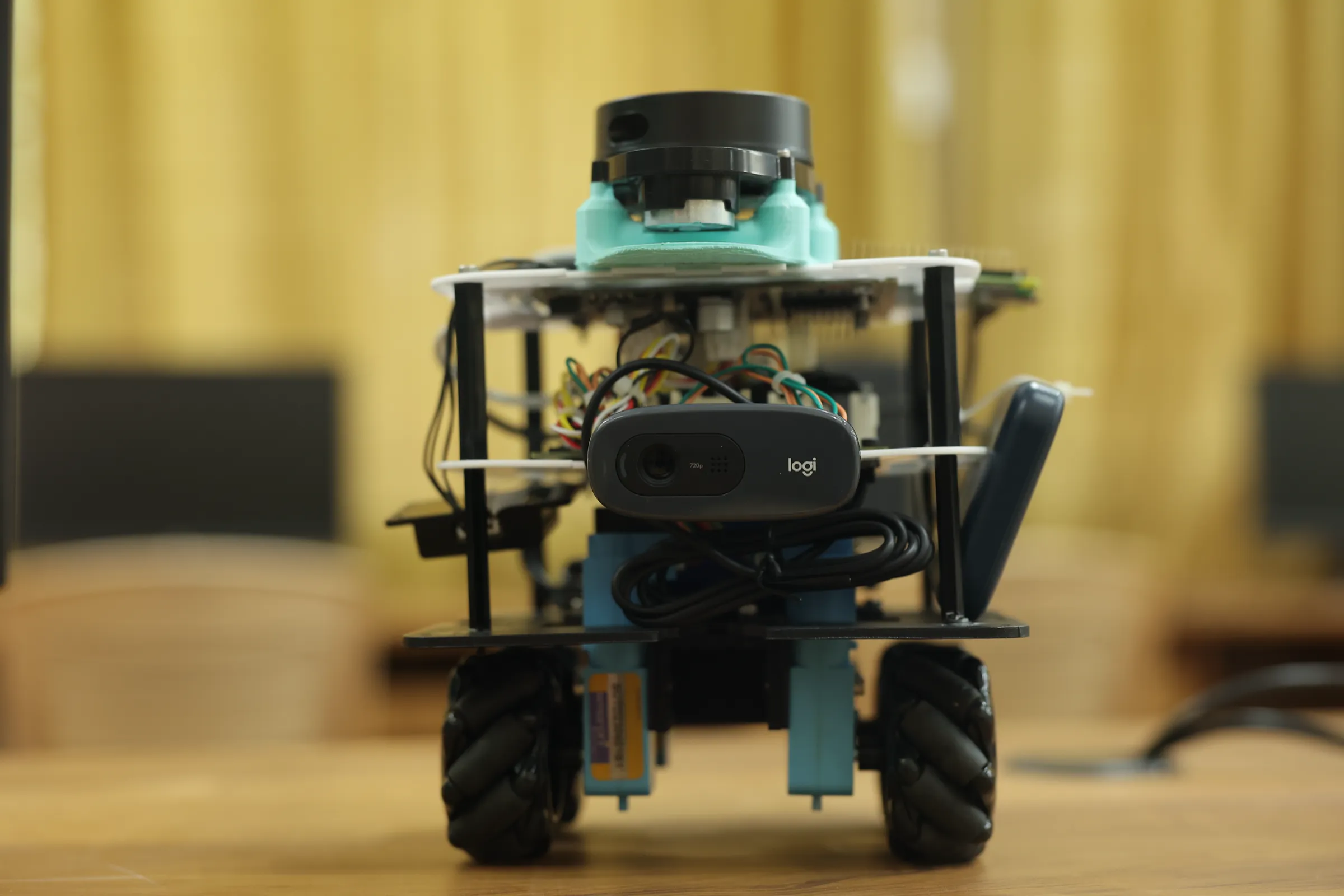 Autonomous mobile robot with onboard camera and sensors